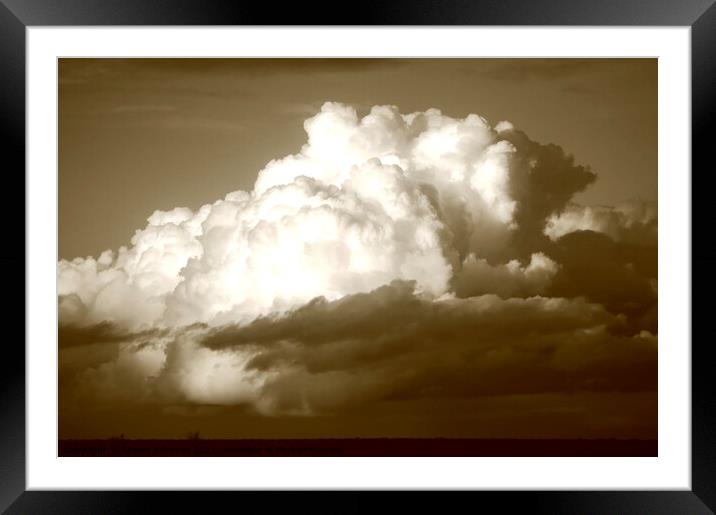 sunlit cumulous cloud Framed Mounted Print by Simon Johnson
