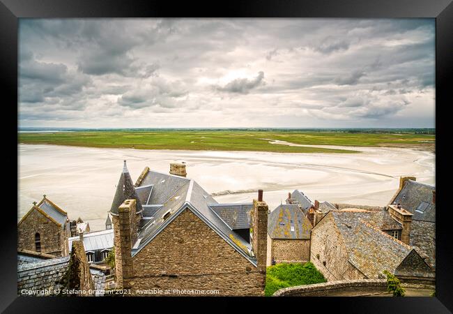 Mont Saint Michel monastery and bay. Normandy, France. Framed Print by Stefano Orazzini