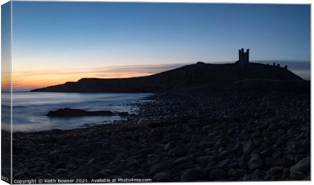 Dunstanburgh castle  before sunrise Canvas Print by Keith Bowser