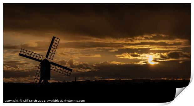 Windmill silhouette at dusk Print by Cliff Kinch