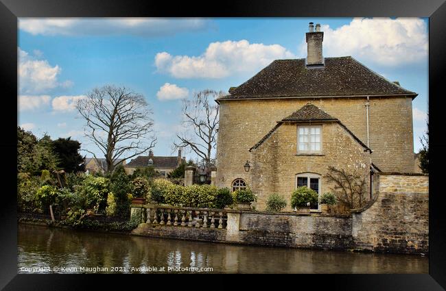 Stone Built House On The Bank Of The River Windrush Framed Print by Kevin Maughan