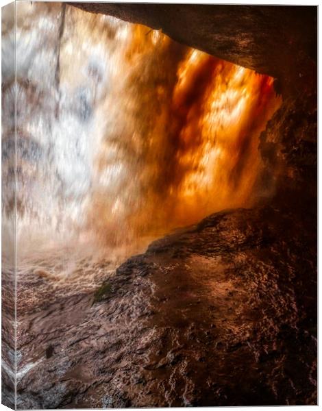 Standing behind A large waterfall in a cave Canvas Print by simon cowan