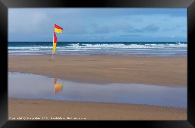 Yellow and red beach safety flag  Framed Print by Joy Walker