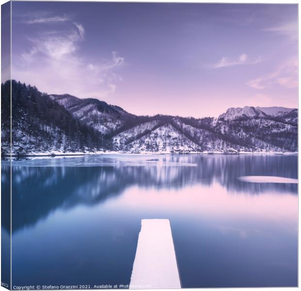 Gramolazzo iced lake and snowy pier in Apuan mountains. Italy Canvas Print by Stefano Orazzini