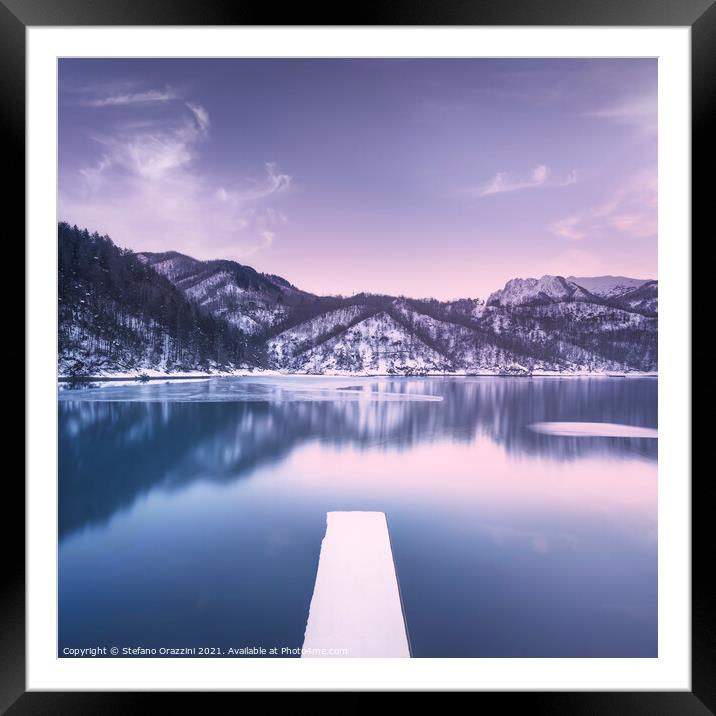 Gramolazzo iced lake and snowy pier in Apuan mountains. Italy Framed Mounted Print by Stefano Orazzini