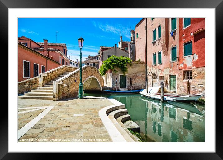 Venice cityscape, canal, bridge and traditional buildings. Framed Mounted Print by Stefano Orazzini