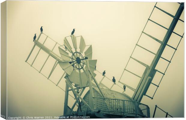 A misty morning at St Benet's mill Norfolk  Canvas Print by Chris Warren