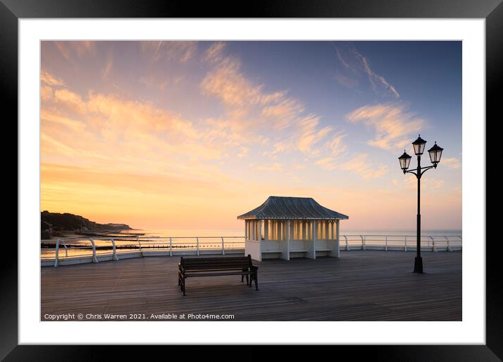 Lampost and bench at Cromer Norfolk sunset Framed Mounted Print by Chris Warren