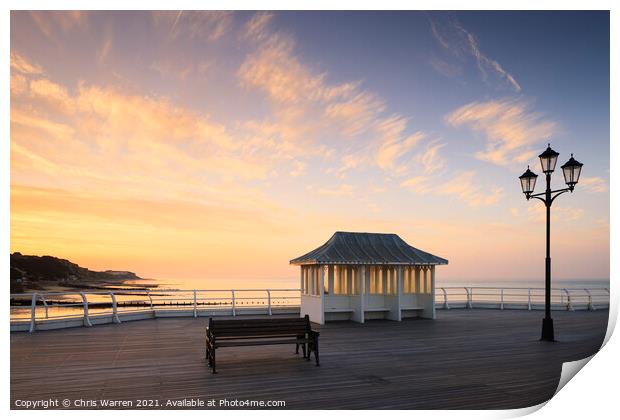 Lampost and bench at Cromer Norfolk sunset Print by Chris Warren