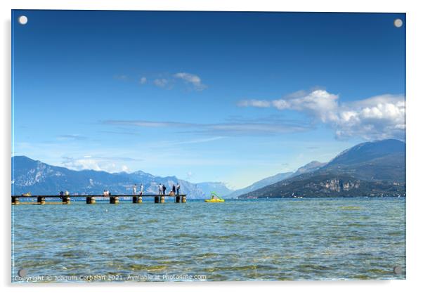 Calm water lake in Garda, Italy with a wooden walkway on a sunny Acrylic by Joaquin Corbalan