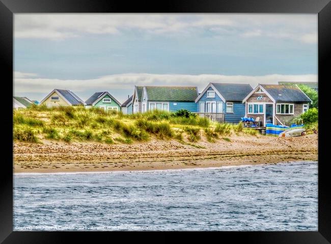 Beach huts on Mudeford Spit Framed Print by Beryl Curran