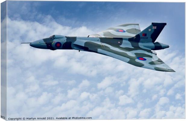 Avro Vulcan XH558 Above the Clouds Canvas Print by Martyn Arnold