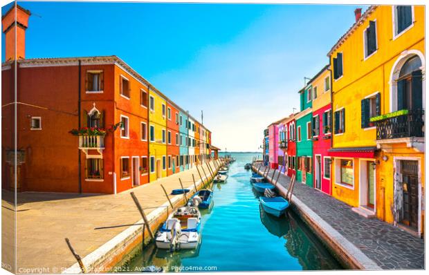 Burano island canal, colorful houses and boats, Venice Canvas Print by Stefano Orazzini