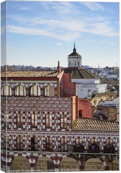 Plaza Alta red and white buildings in Badajoz, Spain Canvas Print by Luis Pina