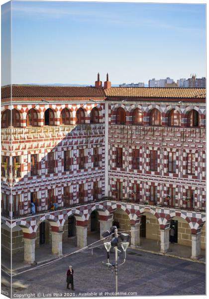 Plaza Alta red and white buildings in Badajoz, Spain Canvas Print by Luis Pina