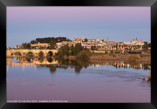 Badajoz city at sunset with river Guadiana in Spain Framed Print by Luis Pina