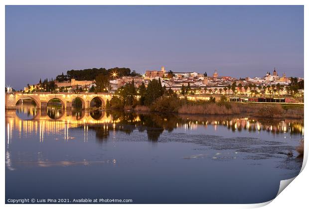 Badajoz city at night with river Guadiana in Spain Print by Luis Pina
