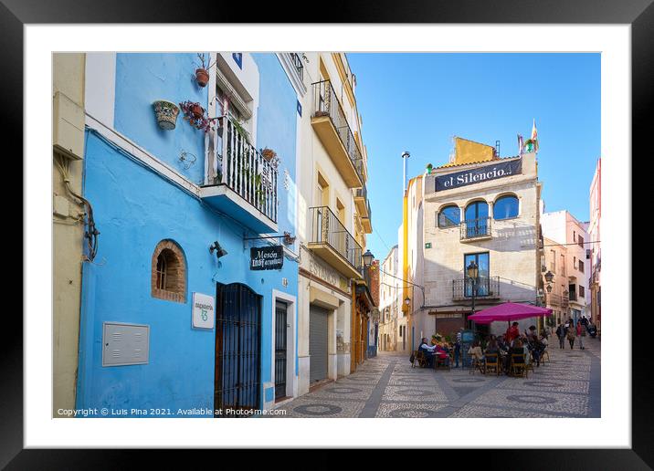 Badajoz beautiful antique street view with traditional colorful buildings in Spain Framed Mounted Print by Luis Pina