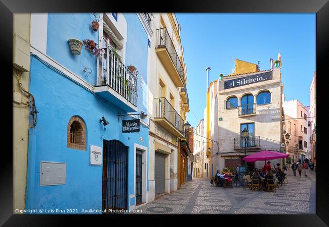 Badajoz beautiful antique street view with traditional colorful buildings in Spain Framed Print by Luis Pina