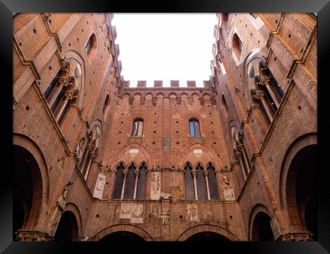 Courtyard of the Podesta in the Palazzo Pubblico in Siena Framed Print by Dietmar Rauscher