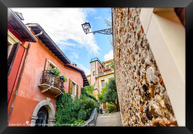 Verona, italy - october 1, 2021: alleys of Verona among which yo Framed Print by Joaquin Corbalan