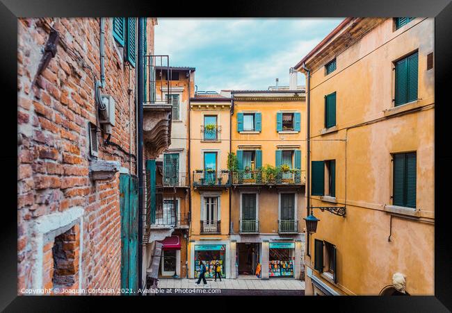 Verona, italy - october 1, 2021: alleys of Verona among which yo Framed Print by Joaquin Corbalan