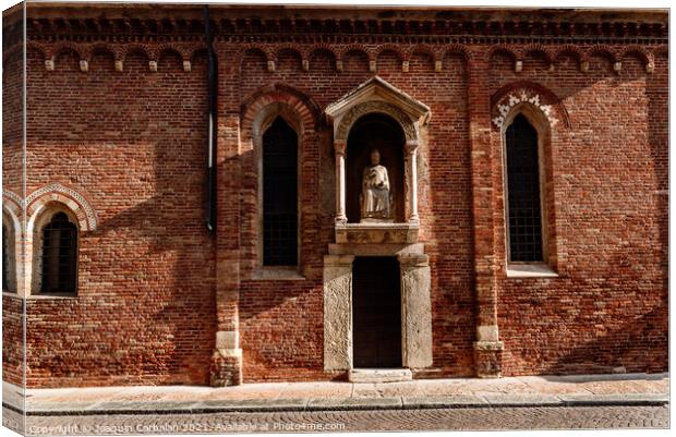 Brick facade in the afternoon sun of a religious Veronese hermit Canvas Print by Joaquin Corbalan