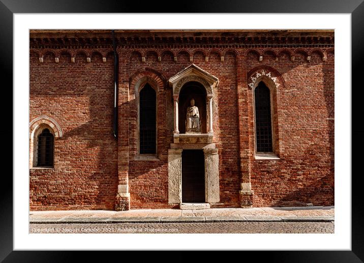 Brick facade in the afternoon sun of a religious Veronese hermit Framed Mounted Print by Joaquin Corbalan