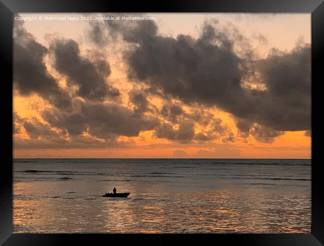 Cloudy sunrise and fisherman Framed Print by Mehmood Neky