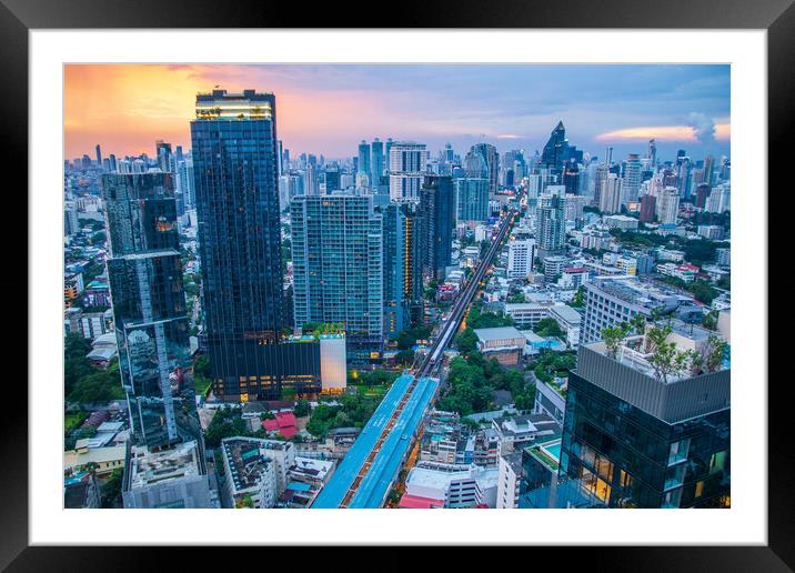 The Cityscape, the Railway of the Skytrain and the skyscraper of Bangkok in Thailand Southeast Asia at the Evening Framed Mounted Print by Wilfried Strang