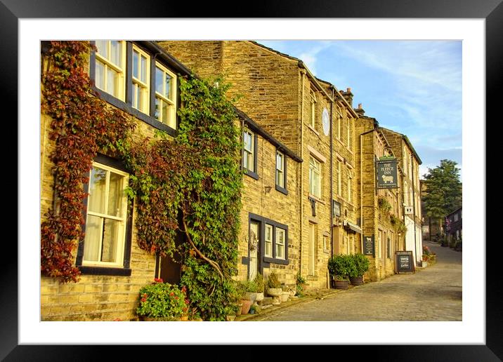 Main Street in Haworth, West Yorkshire. Framed Mounted Print by David Birchall