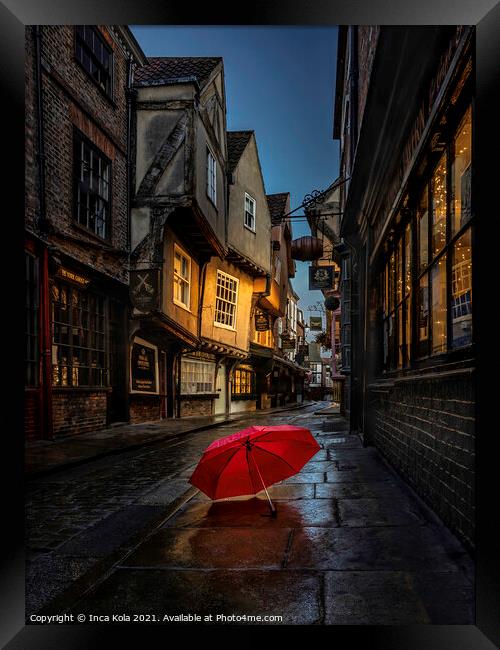 Red Umbrella On The Pavement Of The Shambles Framed Print by Inca Kala
