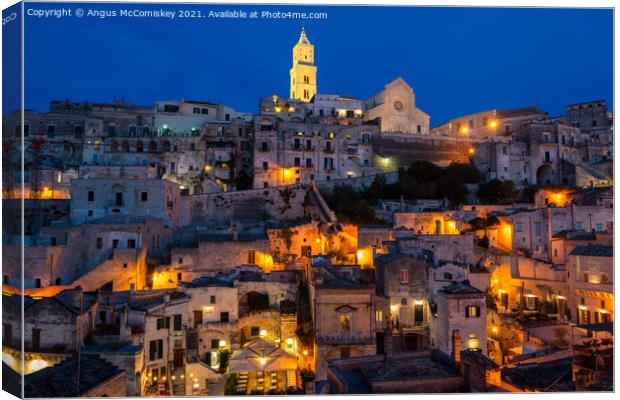 View across Sassi District of Matera by night Canvas Print by Angus McComiskey