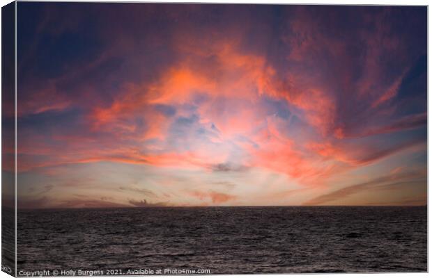 Red sky over the sea of Mull Canvas Print by Holly Burgess
