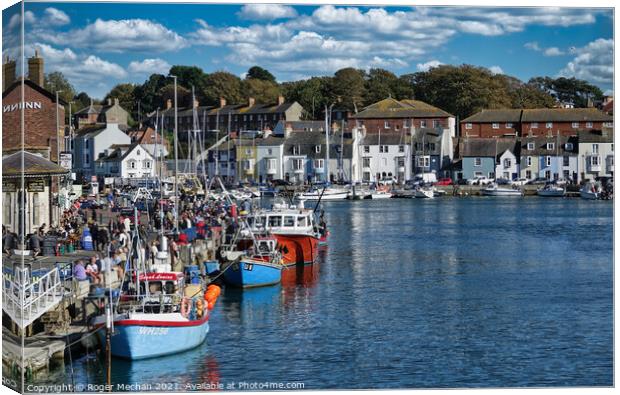 Bustling Weymouth Harbour Canvas Print by Roger Mechan