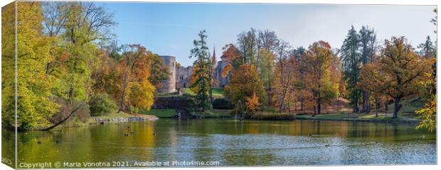 View of lake and medieval castle in autumn.  Canvas Print by Maria Vonotna