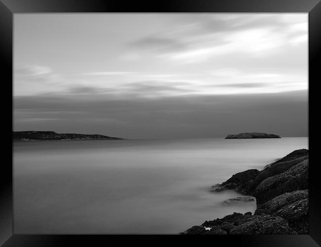 Rocks on the water Framed Print by Dimitrios Paterakis