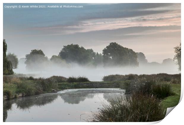 Pond bridge in morning mist Print by Kevin White