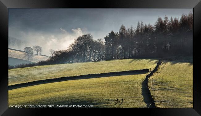 Fields above Bamford in morning mists Framed Print by Chris Drabble