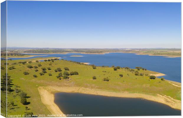 Dam lake reservoir drone aerial view of Barragem do Caia Dam olive trees landscape in Alentejo, Portugal Canvas Print by Luis Pina