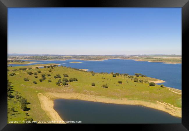 Dam lake reservoir drone aerial view of Barragem do Caia Dam olive trees landscape in Alentejo, Portugal Framed Print by Luis Pina