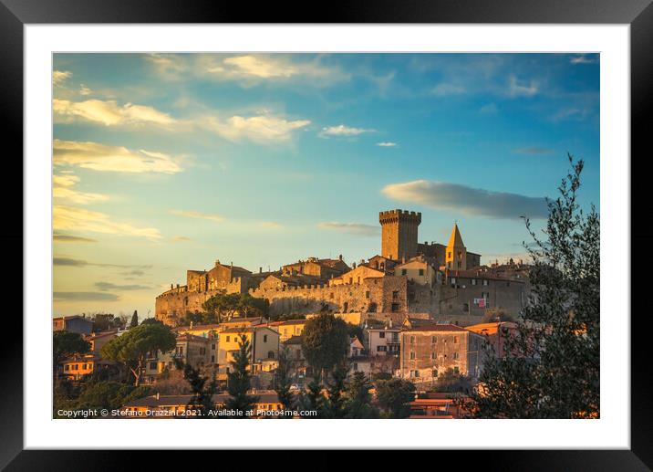 Capalbio village skyline at sunset. Maremma, Tuscany. Framed Mounted Print by Stefano Orazzini