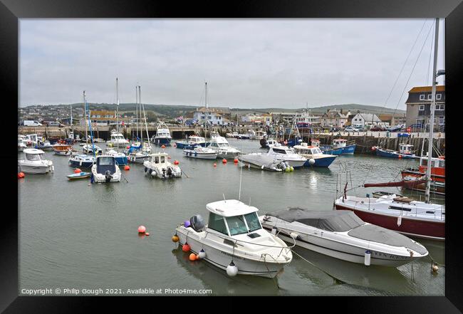 Boats in West Bay harbour Framed Print by Philip Gough