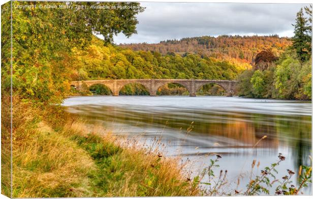 The River Tay in Autumn at Dunkeld, Perthshire Canvas Print by Navin Mistry