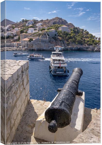 Canon standing guard over Hydra harbour entrance. Canvas Print by Chris North