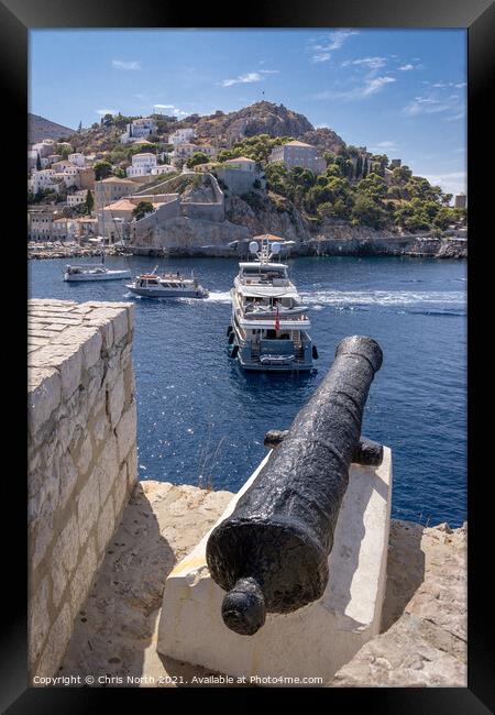 Canon standing guard over Hydra harbour entrance. Framed Print by Chris North
