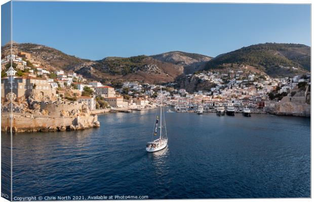 Sailing into Hydra harbour. Canvas Print by Chris North