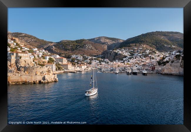 Sailing into Hydra harbour. Framed Print by Chris North
