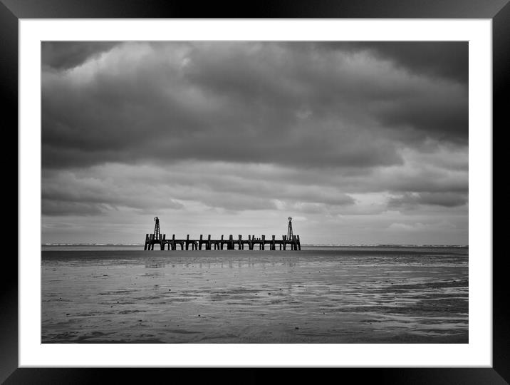 Old Pier under cloud Framed Mounted Print by David McCulloch