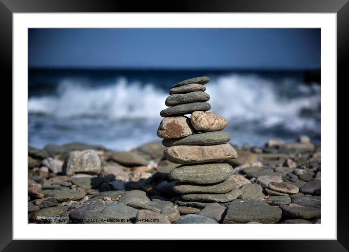 A  cairn pebble tower. Framed Mounted Print by Chris North